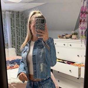 Distressed denim jacket